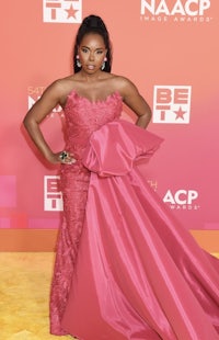 a black woman in a pink gown at the naacp awards